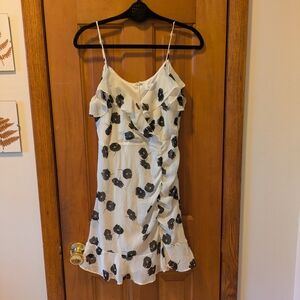 All in Favor White Mini Dress with Black Floral Print